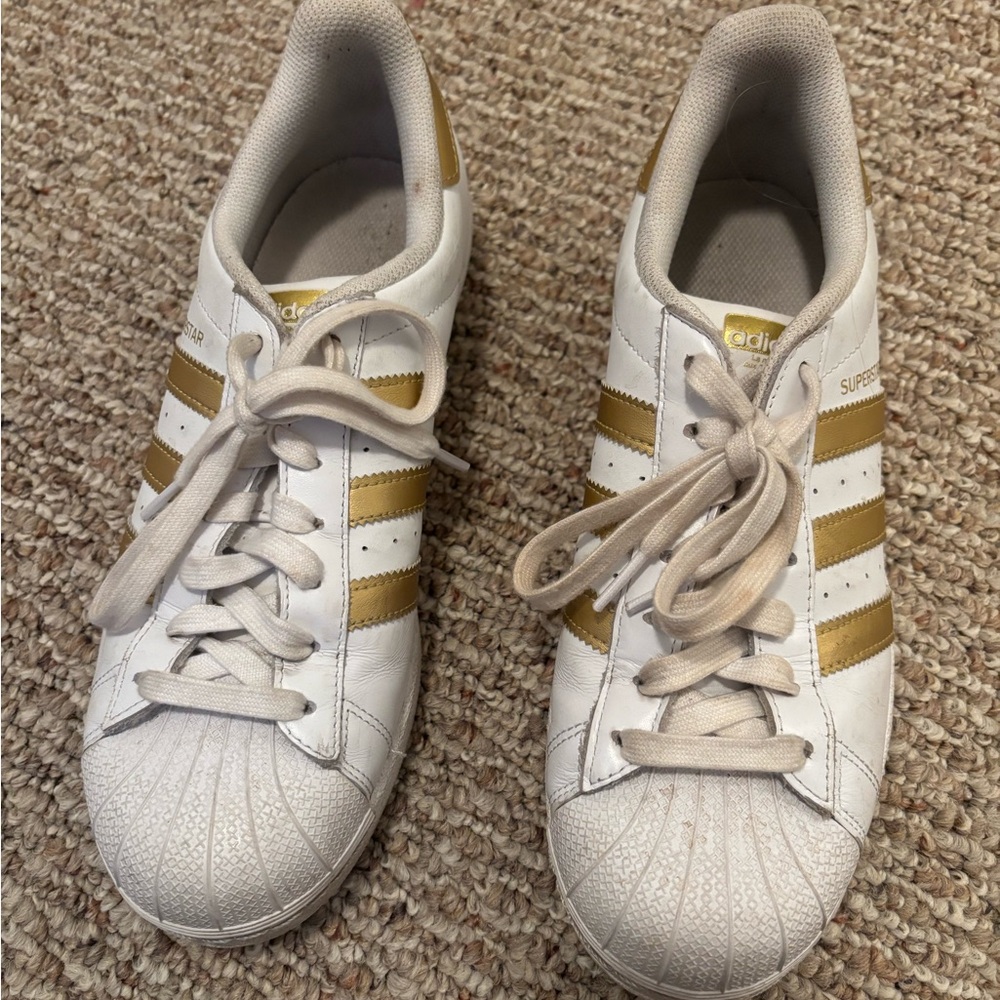 White and gold adidas superstar size 9